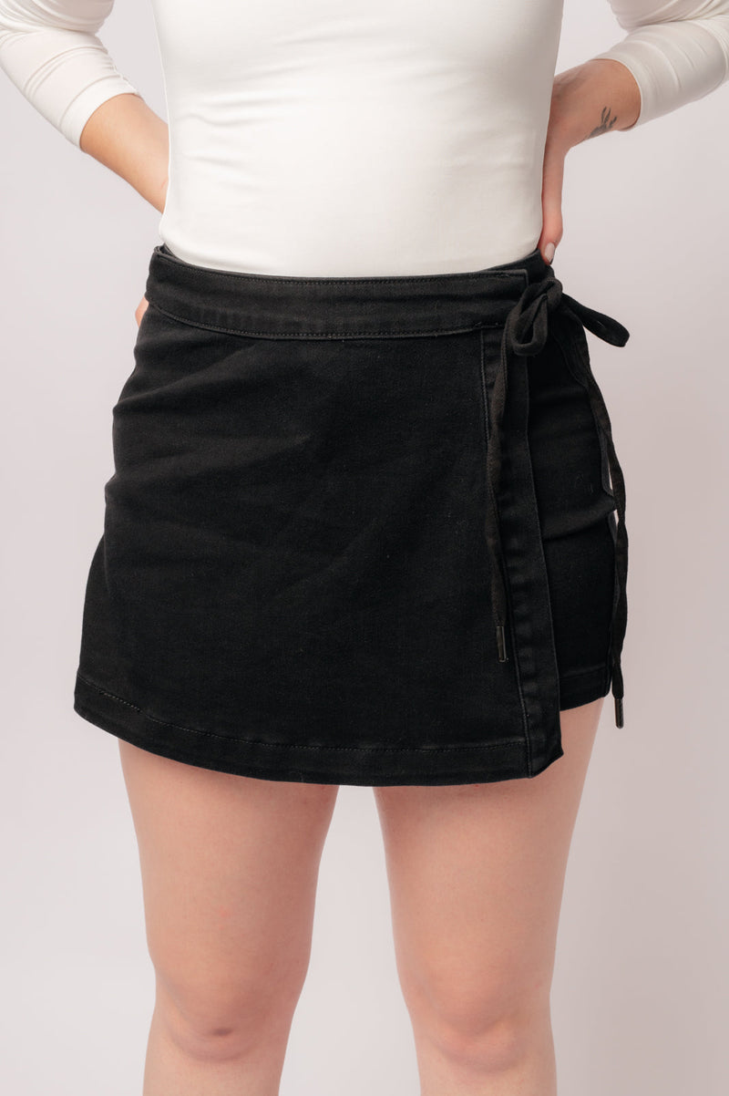 Bentli High Rise Side Tie Denim Skort in Black - Maple Row Boutique