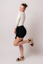 Bentli High Rise Side Tie Denim Skort in Black - Maple Row Boutique