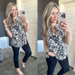 Sleeveless Gabby Front Top In Tropical Black, Pale Pink & White Florals - Maple Row Boutique 