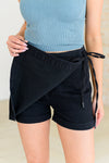Bentli High Rise Side Tie Denim Skort in Black - Maple Row Boutique