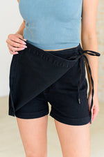 Bentli High Rise Side Tie Denim Skort in Black - Maple Row Boutique