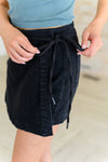 Bentli High Rise Side Tie Denim Skort in Black - Maple Row Boutique
