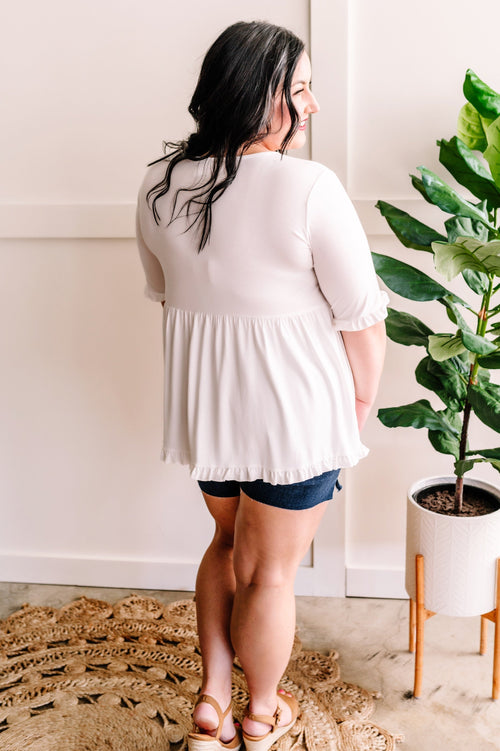 Ruffled V Neck Babydoll Top In Soft Ivory