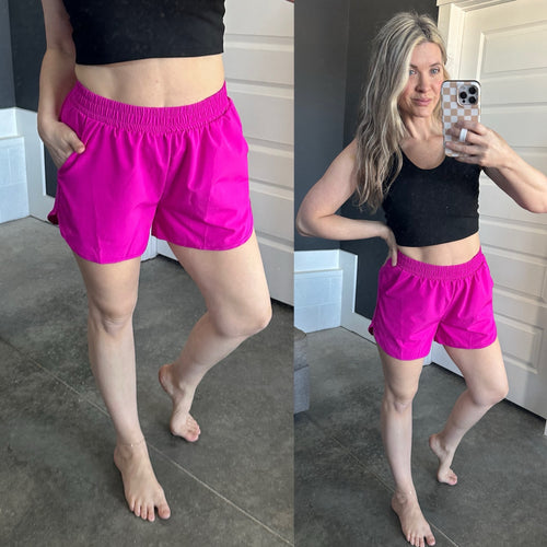 Athletic Flowy Shorts With Pockets In Bright Fuchsia - Maple Row Boutique 