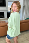 Airflow Peplum Ruffle Sleeve Top in Sage - Maple Row Boutique 