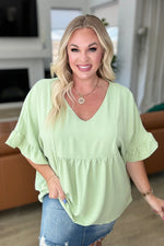 Airflow Peplum Ruffle Sleeve Top in Sage - Maple Row Boutique 