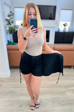 Bentli High Rise Side Tie Denim Skort in Black - Maple Row Boutique