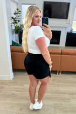 Bentli High Rise Side Tie Denim Skort in Black - Maple Row Boutique