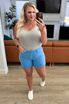 Celeste Mid Rise Shield Pocket Cutoff Shorts in Sky Blue - Maple Row Boutique