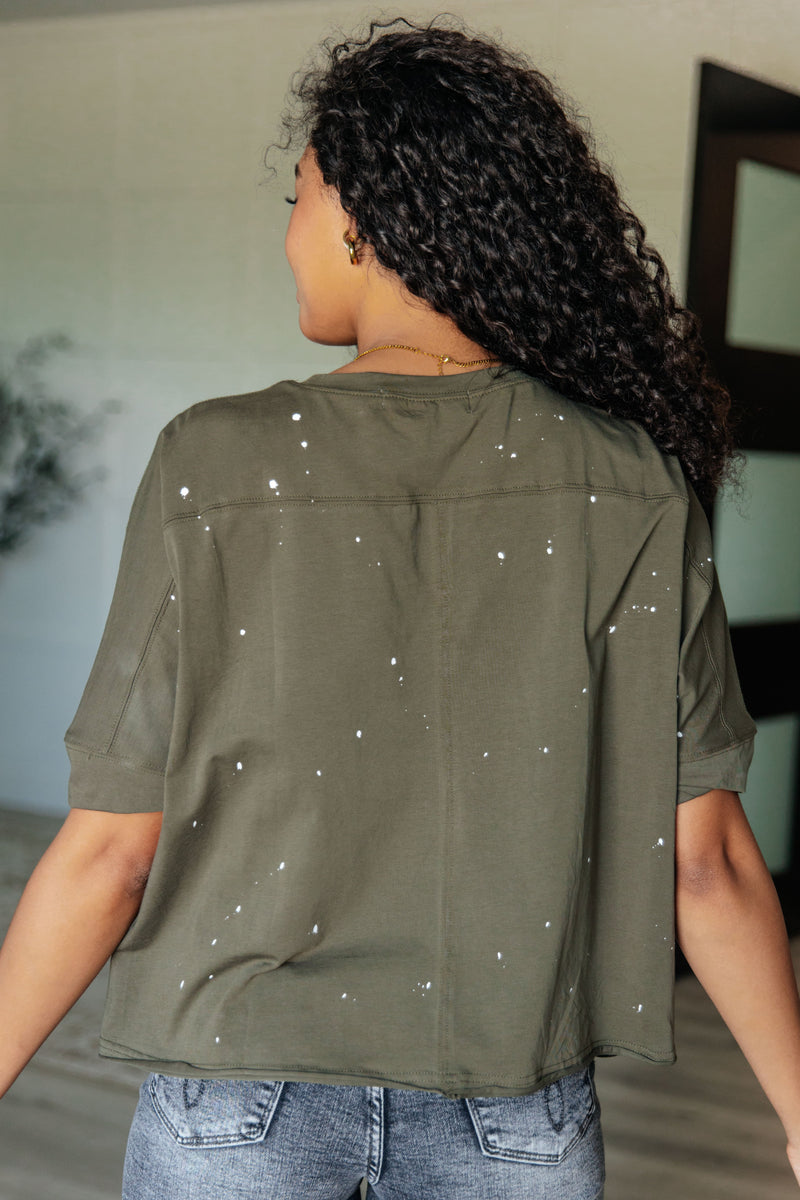 Less Than Stressed Asymmetrical Distressed Top - Maple Row Boutique