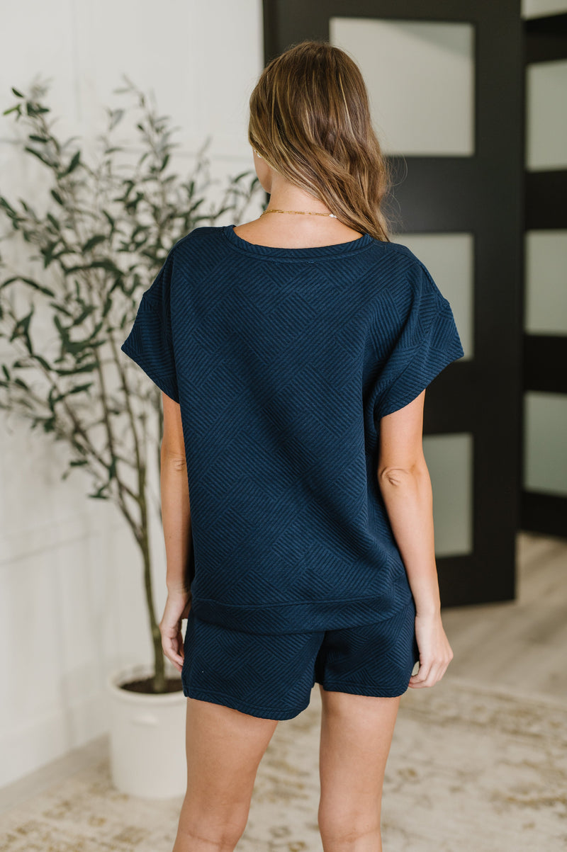 Love on the Loose Quilted Top in Navy - Maple Row Boutique