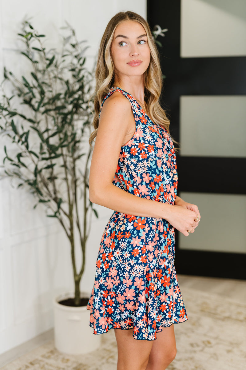 Meadow Mischief Sleeveless Romper in Navy/Orange/Teal - Maple Row Boutique
