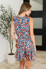 Meadow Mischief Sleeveless Romper in Navy/Orange/Teal - Maple Row Boutique