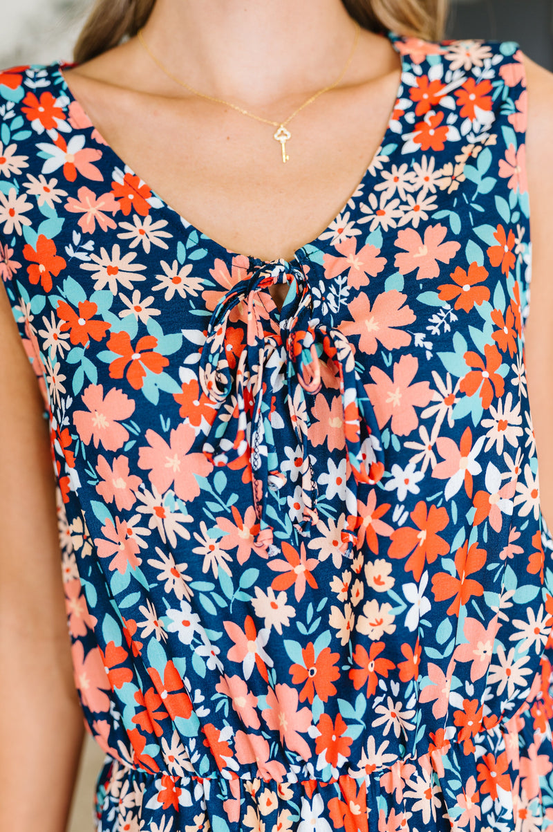 Meadow Mischief Sleeveless Romper in Navy/Orange/Teal - Maple Row Boutique