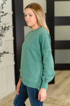 Talk Cozy to Me Stepped Hem Pullover in Dark Green - Maple Row Boutique