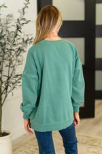 Talk Cozy to Me Stepped Hem Pullover in Dark Green - Maple Row Boutique