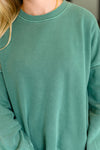 Talk Cozy to Me Stepped Hem Pullover in Dark Green - Maple Row Boutique